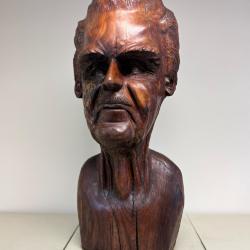 Carved wooden bust self-portrait by Fred Carter