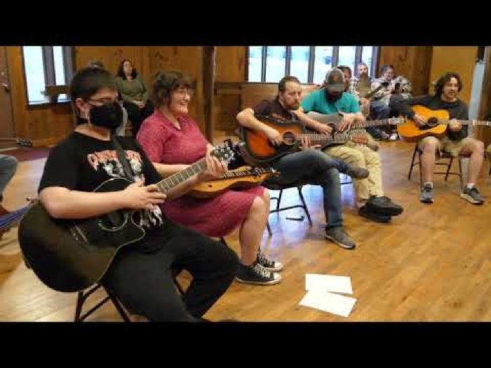 Conducting workshop led by Aliya Ultan at Cowan Community Center
