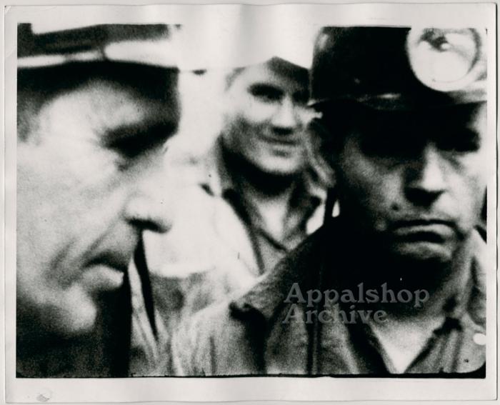 Film still of miners in hats, exterior - UMWA 1970:  A House Divided